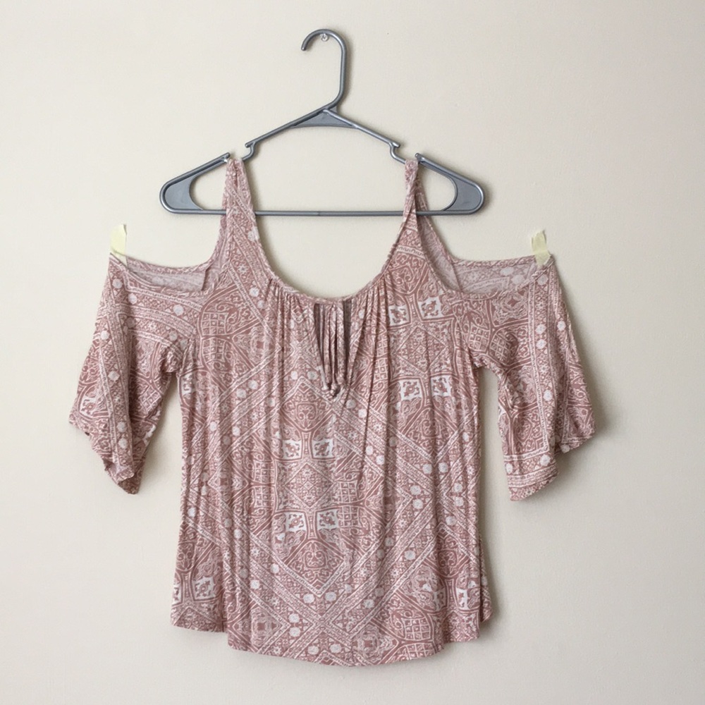 Loose fitting off the shoulder shirt